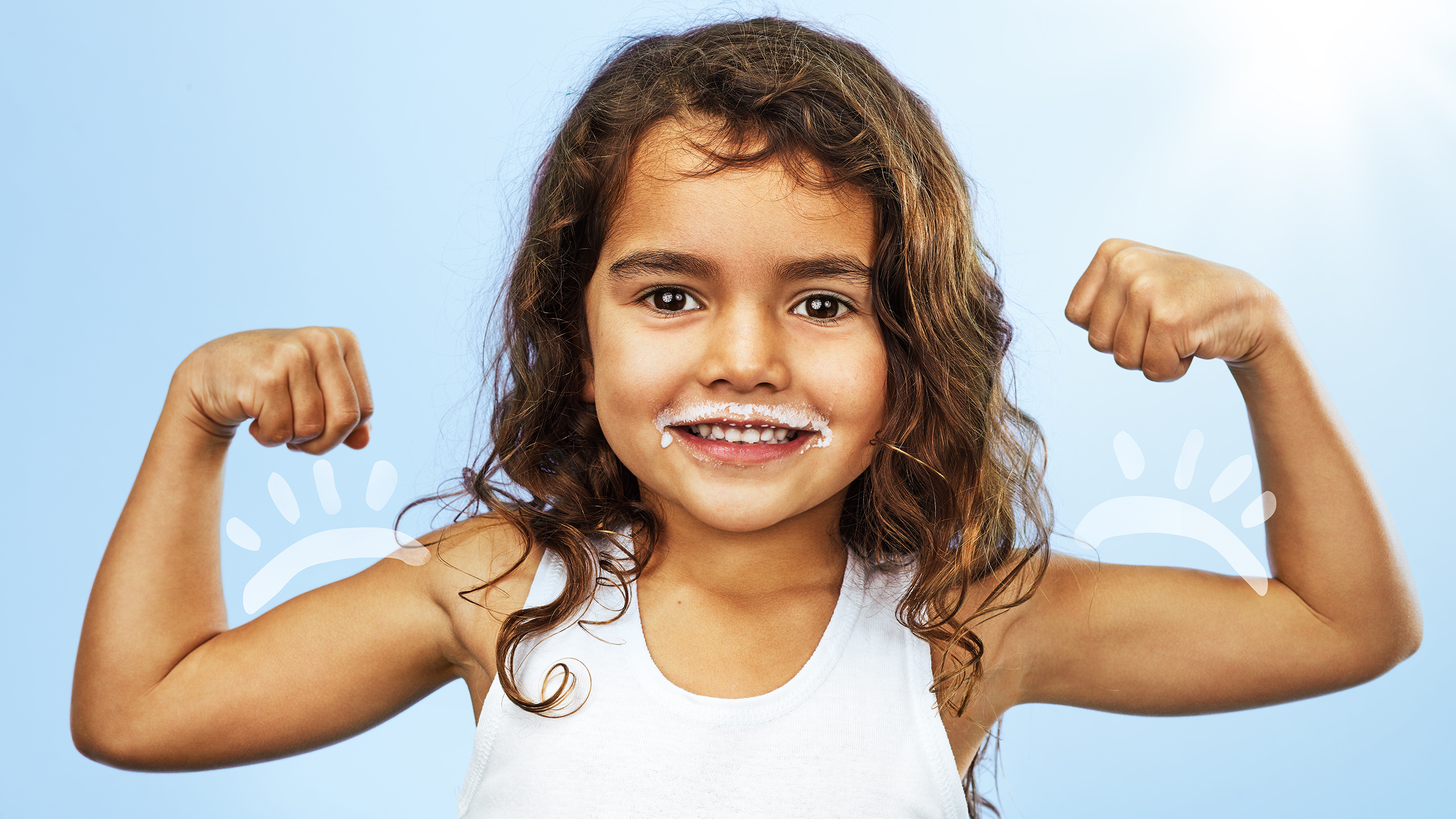happy young girl with milk moustache and illustrated muscles