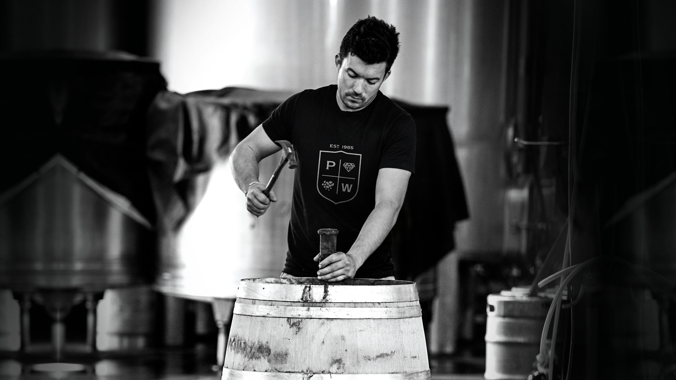 Tried-and-True-Design-Auckland-Pask-Winery-rebrand-wine-man-with-barrel
